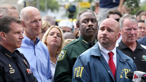 The faces of officials leading the response to the mass shooting in Orlando.