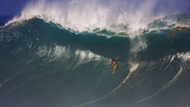 Fellow competitor Daryl 'Flea' Virotsko, who survived this massive wipe-out at Waimea Bay in 2004, says Shawn Dollar 'got really lucky' to survive the Mavericks incident.