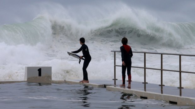 Victoria's deluge pales in comparison to some parts of NSW which received up to 400mm of rain over the weekend. At the Merewether Ocean Baths, huge waves came crashing in.