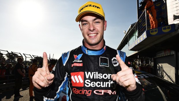 Winners are grinners: Scott McLaughlin celebrates his victory at Phillip Island.