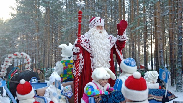 Father Frost blesses a New Year tree to be delivered to Moscow from Veliky Ustyug.