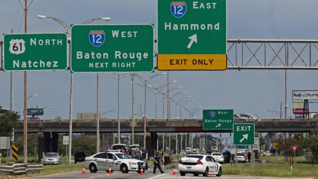 Baton Rouge police block Airline Highway after police were shot on Sunday.