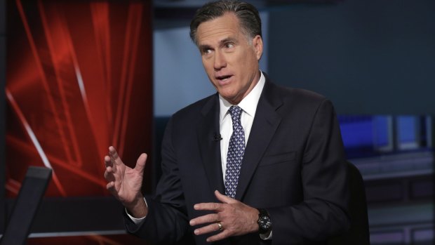 Mitt Romney takes part in a program on the Fox Business Network after criticising Donald Trump in March.