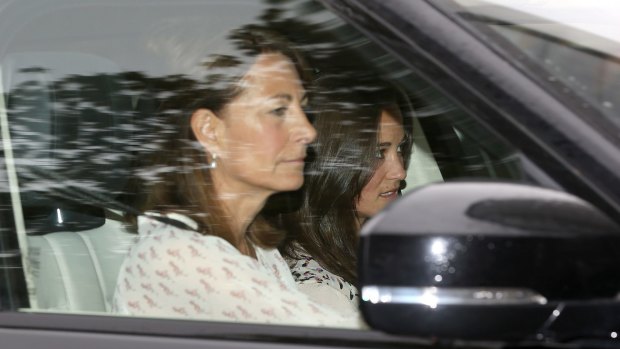 Carole Middleton and Pippa Middleton arrive at Kensington Palace the day after the birth of the Duke and Duchess of Cambridge's daughter.