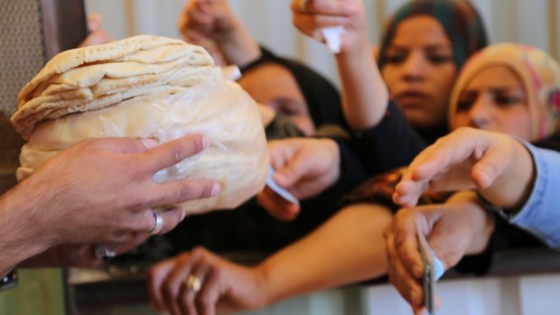 The World Food Program distributes a quarter of a million pieces of fresh bread every morning to refugees in Jordan's Zaatari and Azraq camps. 