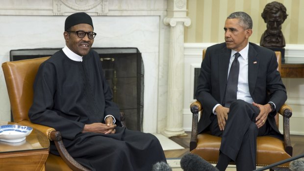 US President Barack Obama, right,  with Nigerian President Muhammadu Buhari in the Oval Office of the White House on Monday.
