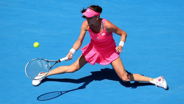 Stretch: Agnieszka Radwanska in action during her quarter final match against Carla Suarez Navarro of Spain.