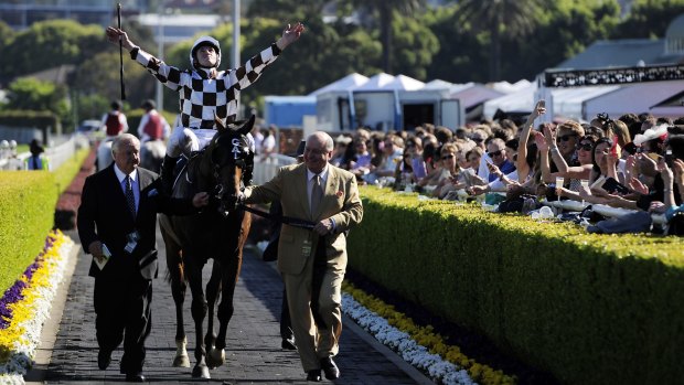 Bred for success: Alan Jones helps lead in Hampton Court after the Spring Champion Stakes.