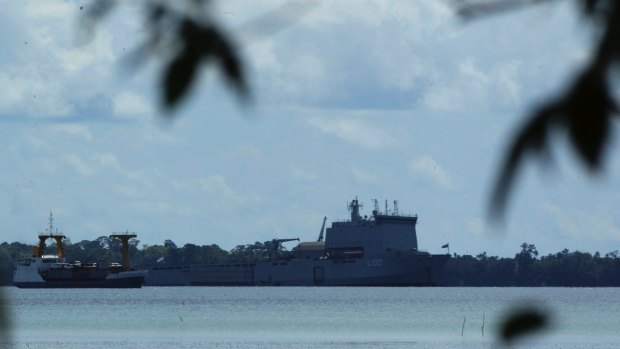 The HMAS Choules, pictured off Manus Island in 2013, is understood to have travelled south of Ho Chi Minh City to return 50 Vietnamese asylum seekers.