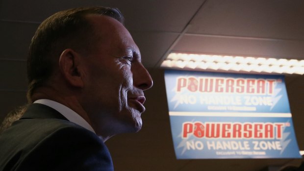 Prime Minister Tony Abbott during his visit to a Harvey Norman store in Canberra.