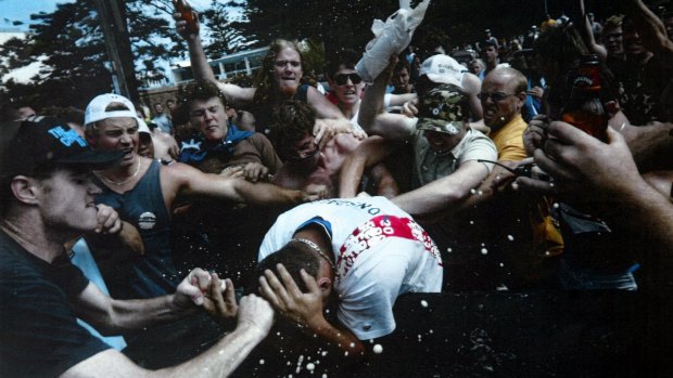 A young man is set upon during the 2005 Cronulla race riots.