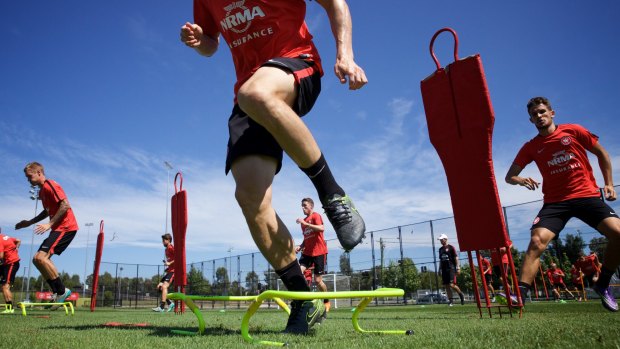 Jumping through hoops: Western Sydney Wanderers players go through their paces. 