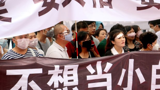 Tianjin protesters demand answers from the Chinese the government.