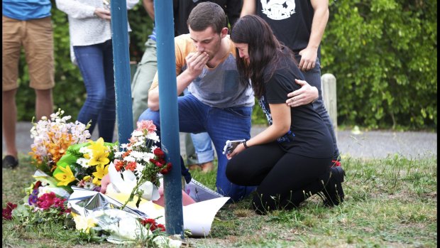  Friends arrive to lay flowers at the scene where Masa Vukotic was stabbed to death.