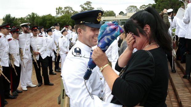 Memorable moment: Graduate Air Force Officer Cadet Joshua McNickle hugs from his mother Vicki Collins.