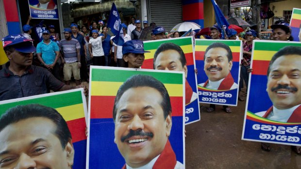 Supporters of Sri Lanka's former president Mahinda Rajapaksa at the conclusion of voting in Colombo on Monday.
