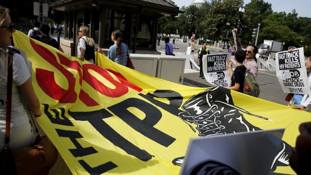 A small group of protesters demonstrate against the TPP trade agreement on Capitol Hill in Washington in June.