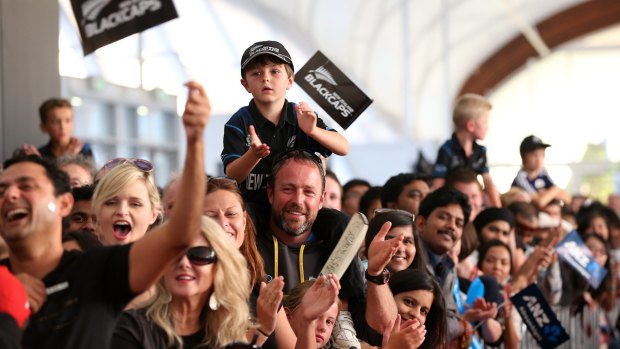 Fans welcome the New Zealand team in Auckland.