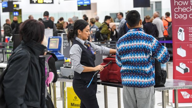 Airport security staff check bags at Melbourne Airport this week.