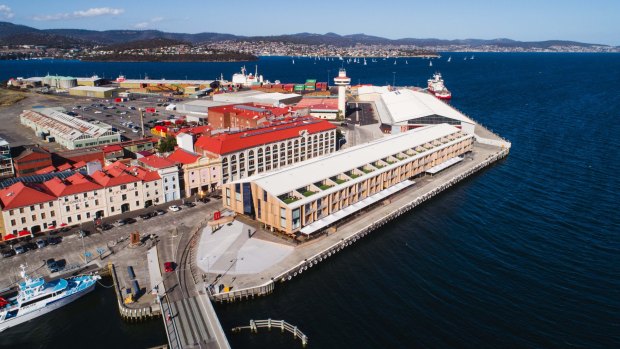 MACq01 at the waterfront with the former Henry Jones industrial complex (now housing the Henry Jones Art Hotel) behind.