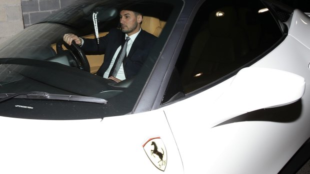 Auburn deputy mayor Salim Mehajer leaves an Auburn council meeting in his white Ferrari. 