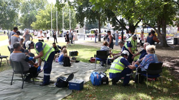 Emergency services set up a triage area in a park near the station and assessed 16 patients.