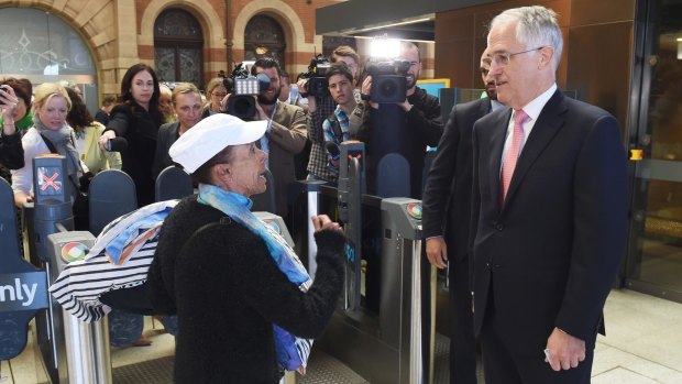 Malcolm Turnbull is confronted by a passenger at Central Station.