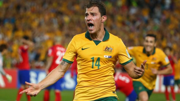 Big moment: James Troisi after scoring during the Asian Cup final.