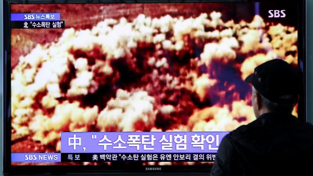 A television screen in Seoul shows a news broadcast about North Korea's nuclear test.