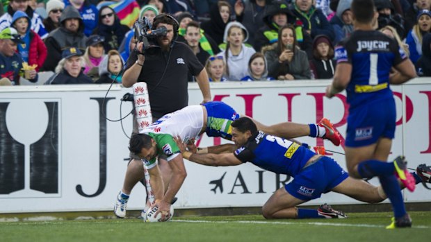 Raiders' Jordan Rapana scores a try.