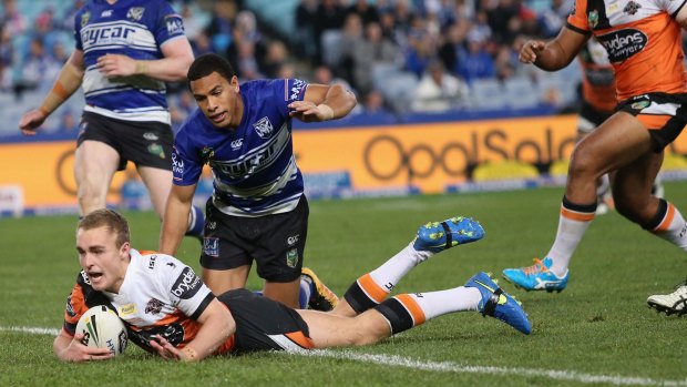 Impressive: Jacob Liddle scores a try during the round 18 NRL match between the Canterbury Bulldogs and the Wests Tigers at ANZ Stadium on July 9.