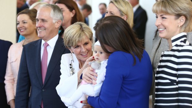 Prime Minister Malcolm Turnbull with female members of his new-look frontbench.