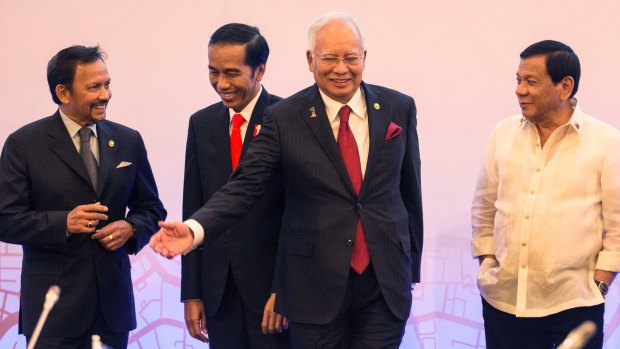 From left, Sultan Hassanal Bolkiah of Brunei Darussalam, Indonesian President Joko Widodo, Malaysian PM Najib Razak and Philippine President Rodrigo Duterte at the ASEAN meeting on Saturday.