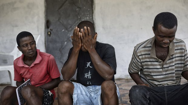 Some of the young men who worked at a crematorium where bodies were burned during the Ebola crisis in Marshall, Liberia, last month.