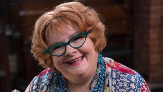 Magda Szubanski as festival announcer Queenie in Three Summers. 