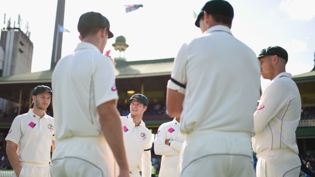 Australian captain Steve Smith with his players after the third Test ended early.