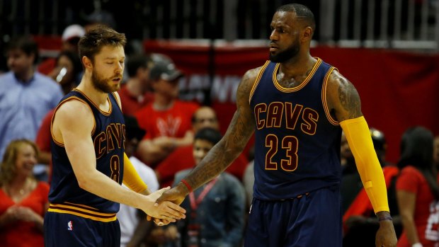 The King and I: Matthew Dellavedova and Cleveland Cavaliers teammate LeBron James react in the third quarter against the Atlanta Hawks during Game Two of the Eastern Conference Finals at Philips Arena in Atlanta.