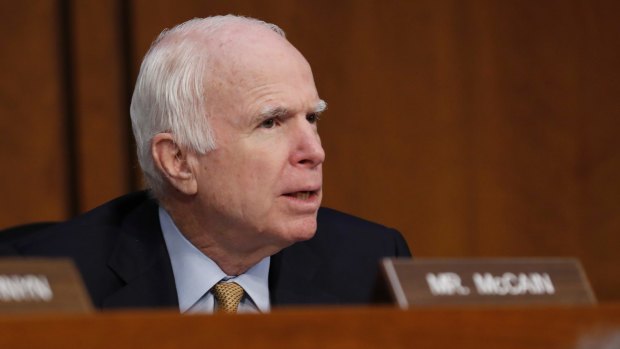 Republican senator John McCain questions former FBI director James Comey during a Senate Intelligence Committee hearing on Capitol Hill.
