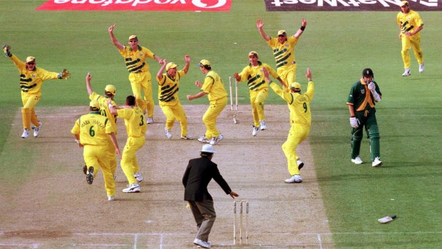 The Australian team celebrates after Allan Donald was run out to tie the 1999 World Cup semi-final and ensure its entry into the final.