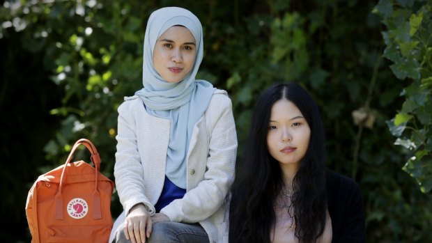 International students Fatim Amran and Naomi Zhao say they decided to study at ANU in Canberra after examining international rankings tables