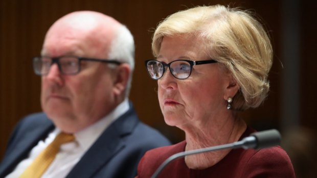 Attorney-General George Brandis and Gillian Triggs at Parliament House on Thursday.
