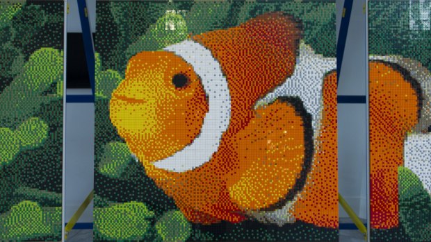 The completed three-panel mosaic revealed a clownfish among seaweed.