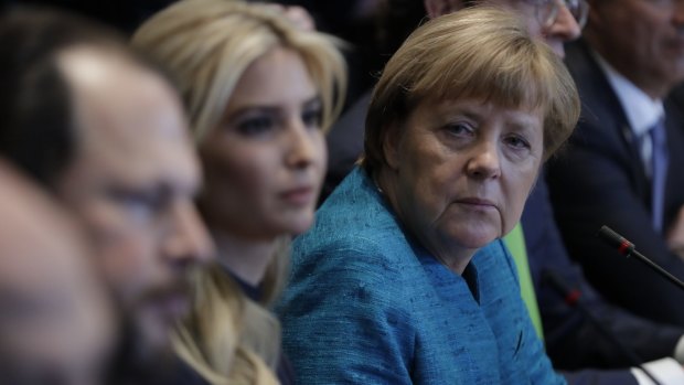 German Chancellor Angela Merkel sits next to Ivanka Trump during a meeting with President Donald Trump at the White House in Washington earlier this month. 
