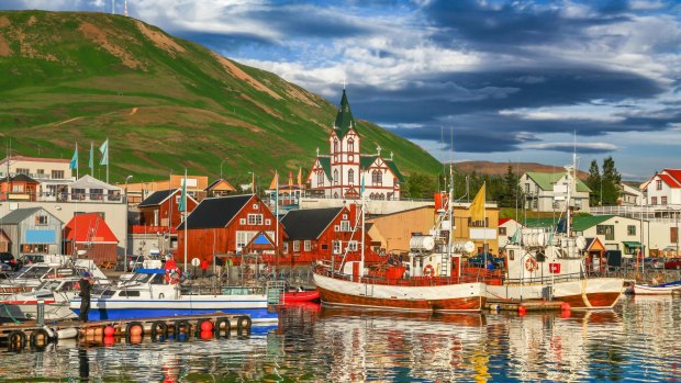 Husavik in Iceland. Collette has an eight-day tour that combines an overland exploration of Iceland with a cruise along the west coast of Greenland.