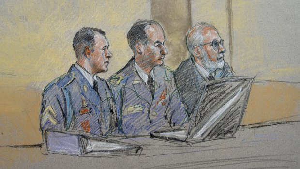 Army Sergeant Bowe Bergdahl, left, defence counsel Lieutenant Colonel Franklin Rosenblatt, centre, and lead defence counsel Eugene Fidell at a preliminary hearing to determine whether Bergdahl should be court-martialed.