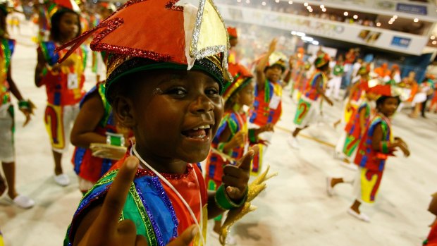 Mirim samba school presentation of Pimpolhos da Grande Rio in Sambodrome in Rio's Carnival.
