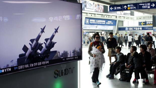 South Koreans watching a broadcast in April of North Korea's surface-to-air missile launch