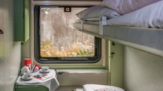 A sleeper compartment on a train. There are advantages to overnight trains but also challenges.