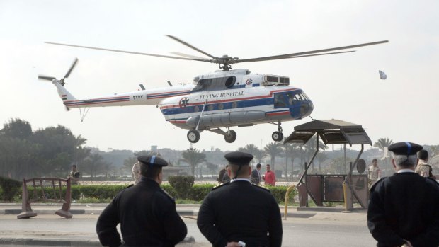 A helicopter ambulance as it takes off carrying Hosni Mubarak from Maadi Military Hospital to the court on Thursday.