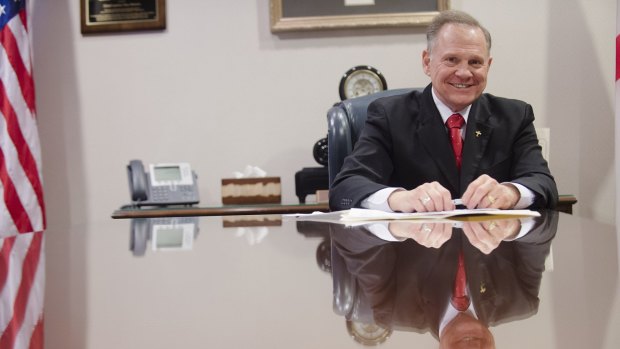 Alabama Chief Justice Roy Moore on Wednesday rests his hands on his order discouraging probate judges from issuing same sex marriage licences.